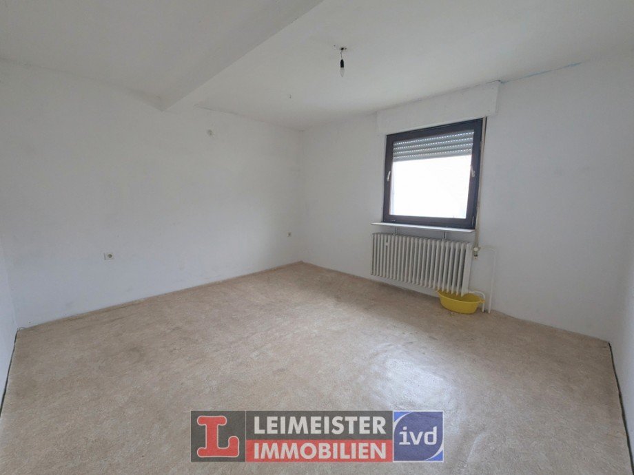 Schlafzimmer DG Zweifamilienhaus Stra�bessenbach