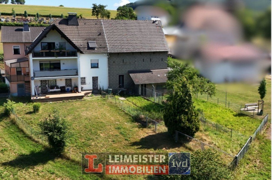 Gartenansicht Mehrfamilienhaus Sommerkahl