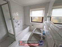 Badezimmer F�r Anleger! Vermietete Erdgeschoss Eigentumswohnung in ruhiger Lage mit Terrasse, 2 Garage & 2 Kellern