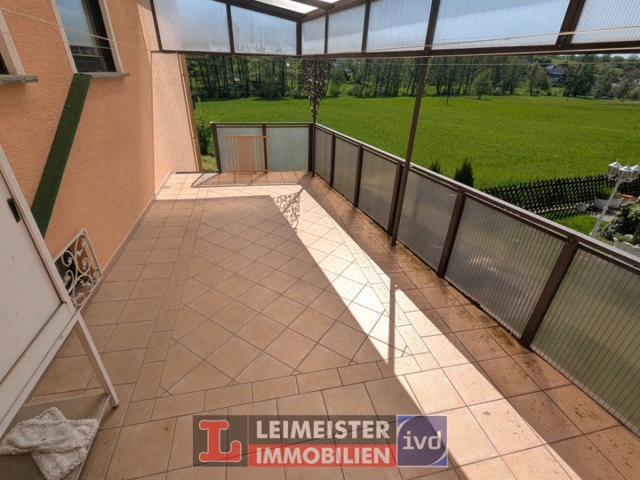 Balkon, Terasse EG Haush�lfte Mehrfamilienhaus Sommerkahl